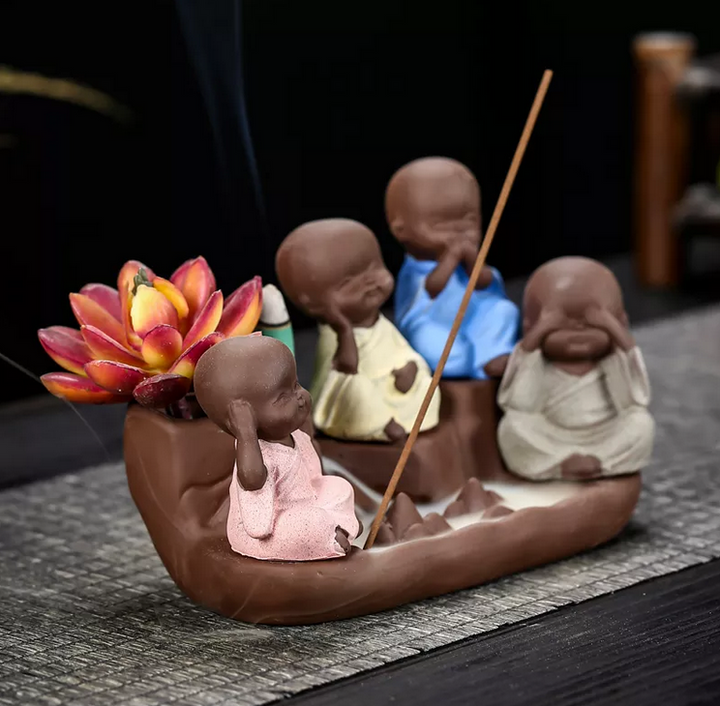 Four Baby Buddha's Backflow Waterfall
