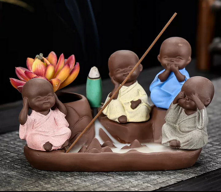 Four Baby Buddha's Backflow Waterfall