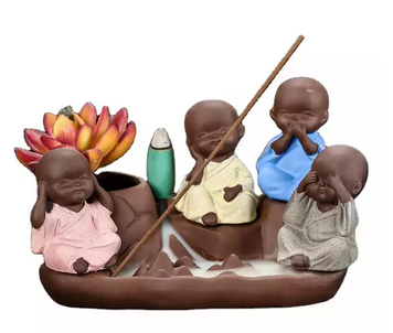 Four Baby Buddha's Backflow Waterfall